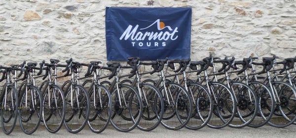 Line up of the Marmot Tours titanium hire bike fleet