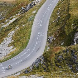 Aerial shot of riders climbing the Galibier with Marmot Tours in the french alps