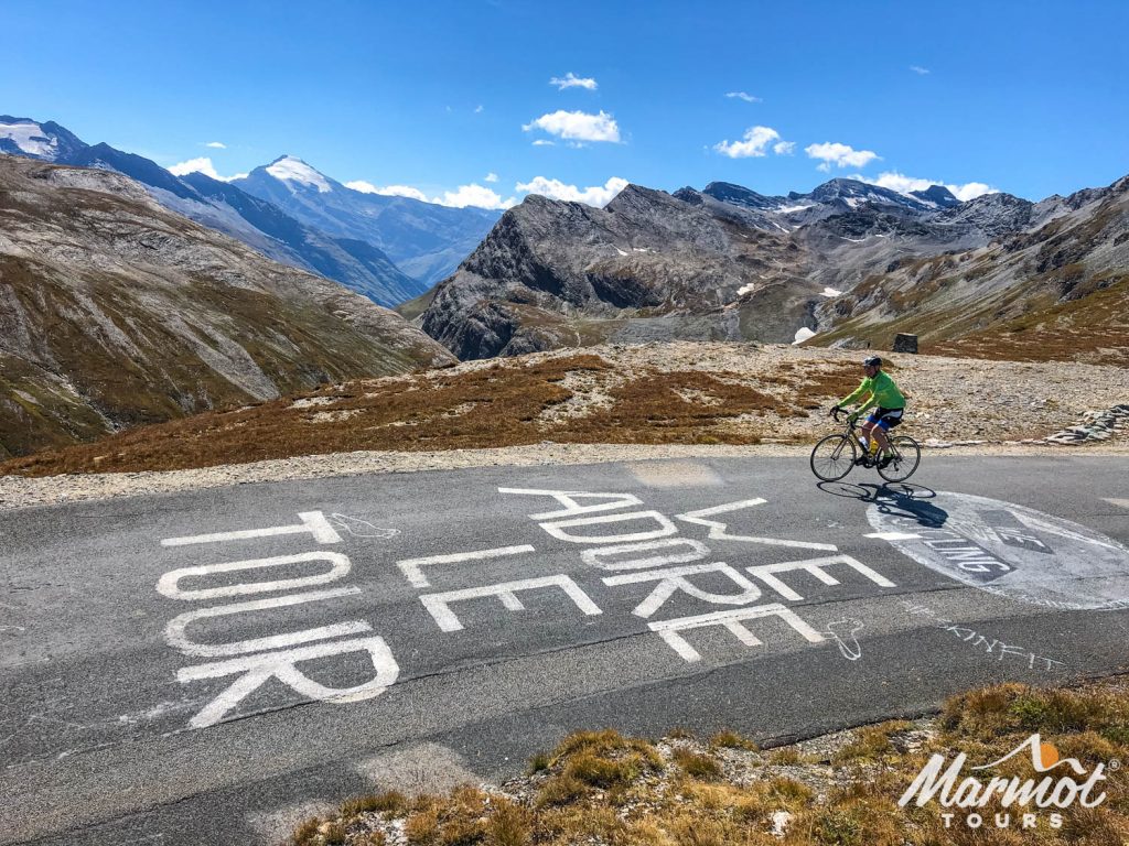 Cyclist on Tour de France road graffiti on Marmot Tours cycling holiday in the Alps