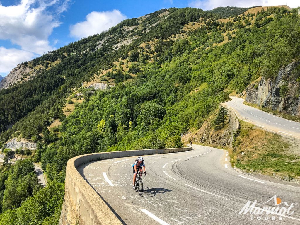 Alpe D'Huez cyclist on guided road cycling holiday in Alps with Marmot Tours