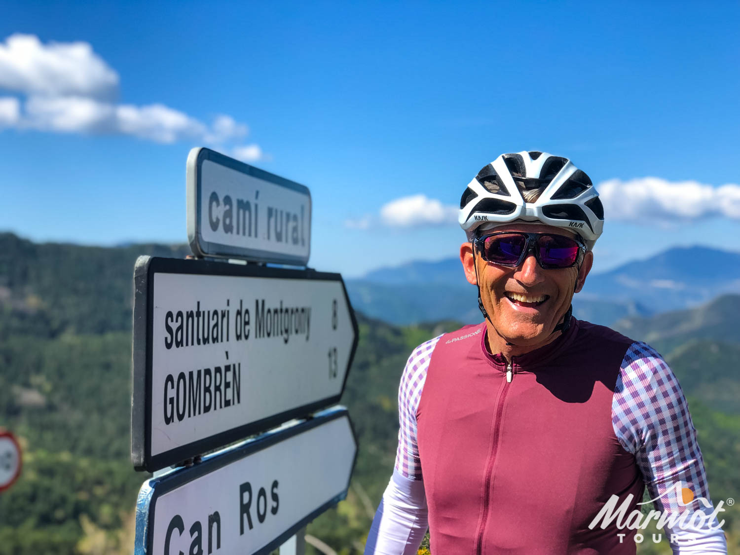 Smiling cyclist on Marmot Tours fully supported road cycling holiday in Catalonia Spain
