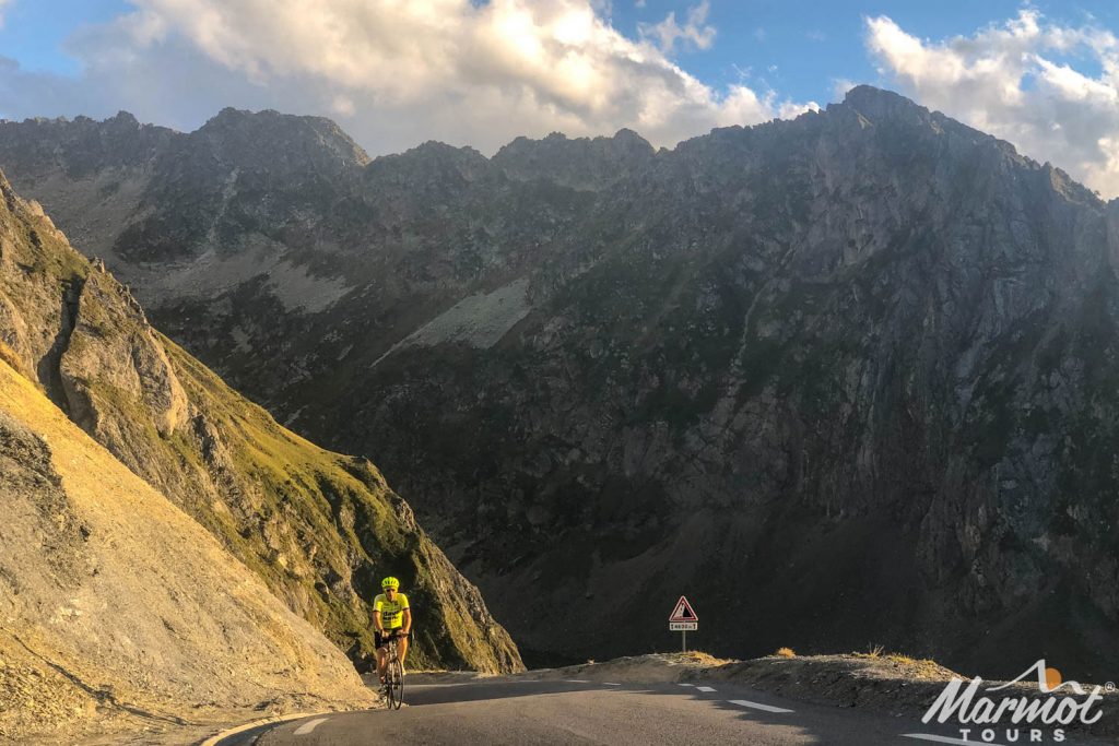 Cyclist summiting Col du Tourmalet in French Pyrenees on Marmot Tours fully supported road cycling holiday