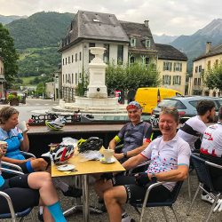 Cyclists enjoying cafe break on Marmot Tours Raid Pyrenean cycling challenge holiday