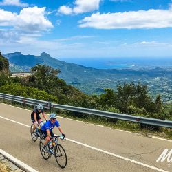 Pair of cyclists enjoying road cycling holiday in Sardinia with Marmot Tours