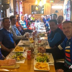 Group of cyclist enjoying lunch on Marmot Tours guided cycling tour of French Alps