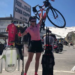 Email cyclist celebrating on Stelvio with Marmot Tours full support cycling tour in Italy