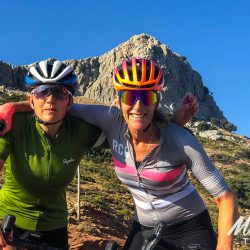 Two happy female cyclists on Marmot Tours supported group cycling holiday Andalusia Spain