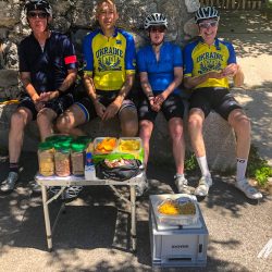 Cyclist sitting in shade with healthy snacks on Marmot Tours road cycling holiday in Slovenia