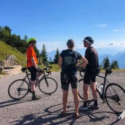 Cyclists and Marmot Tours guide on Monte Zoncolan