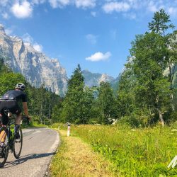Cyclist and beautiful surroundings of Triglav National Park on Marmot Tours guided cycling tour Slovenia