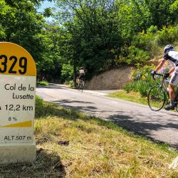 Cyclists climbing Col de la Lusette in South of France on guided cycling holiday with Marmot Tours