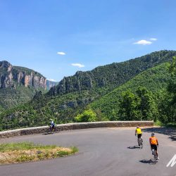 Cyclists admiring view through gorge on guided cycling tour South of France with Marmot Tours
