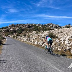 Cyclist climbing El Torcal on Marmot Tours guided road cycling tour in Spain Andalusia