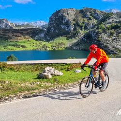 Cyclist climbing Gamoniteiro in Picos de Europa Northern Spain with Marmot Tours guided road cycling holidays