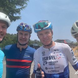Chris Froome poses for a picture with cyclists on Marmot Tours guided road cycling tour of Southern Alps