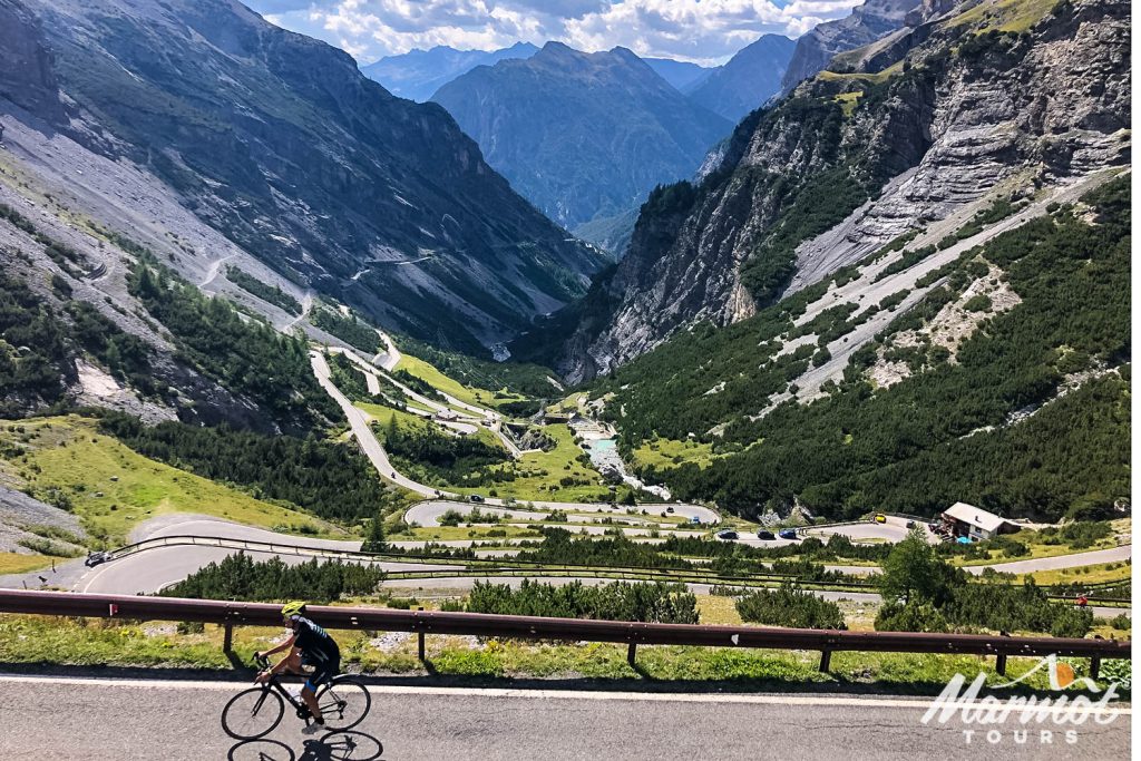 Cyclist enjoying Passo dello Stelvio cycling climb with Marmot Tours guided road cycling holidays