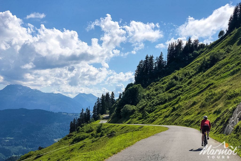 Cyclist enjoying Joux Plane climb in French Alps with Marmot Tours