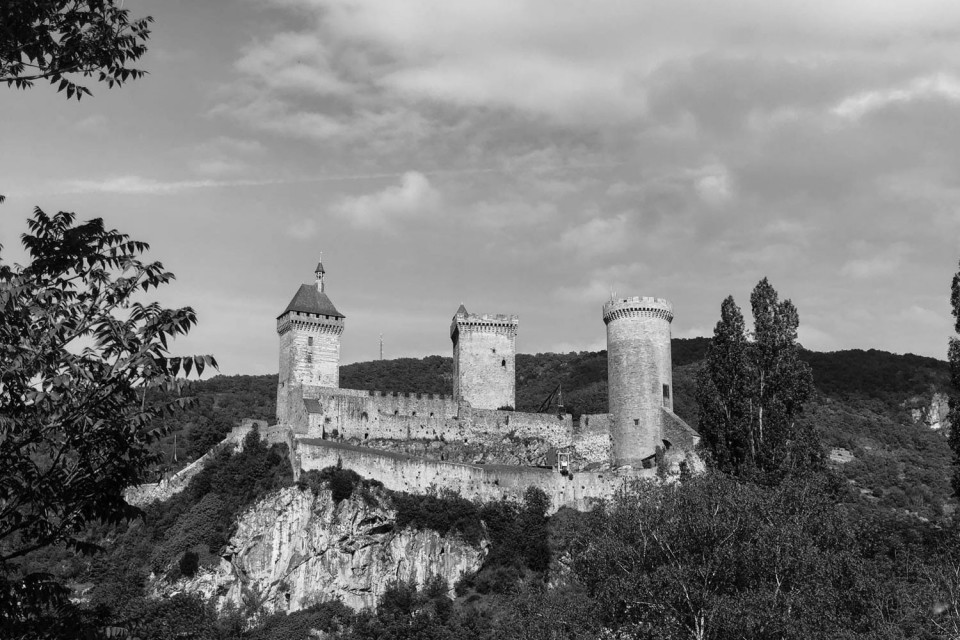Black and white image of chateau on Marmot Tours guided road cycling tour Foothills of Pyrenees