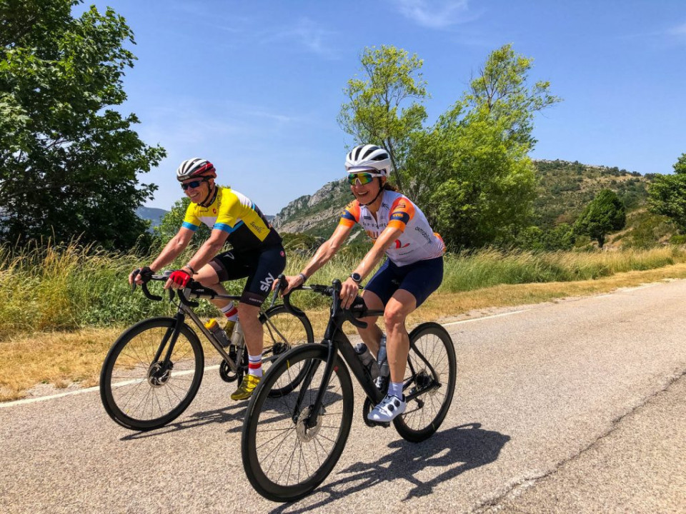 Pair of cyclists climbing Col de Bleine on Raid Alpine road cycling challenge with Marmot Tours road cycling holidays