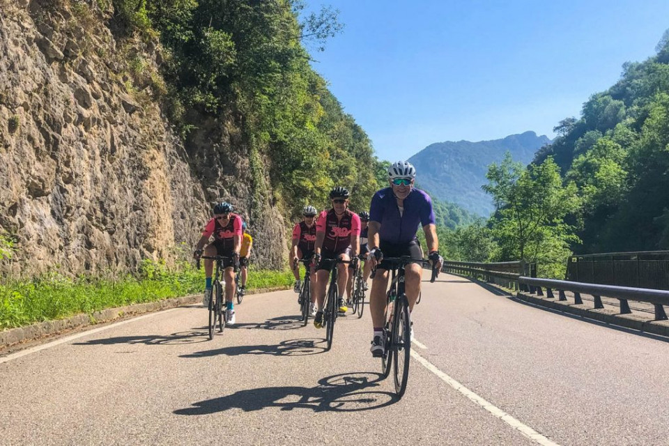 Group of cyclists enjoying sunny ride in Picos Northern Spain with Marmot Tours