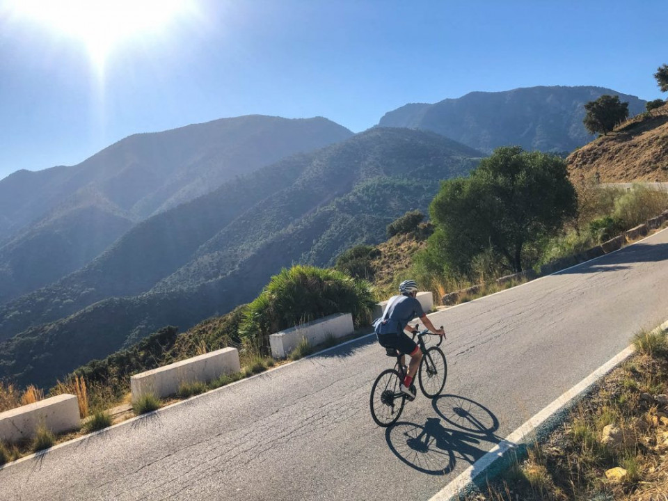 Cyclist climbing on Marmot Tours road cycling holiday in Spain Andalusia