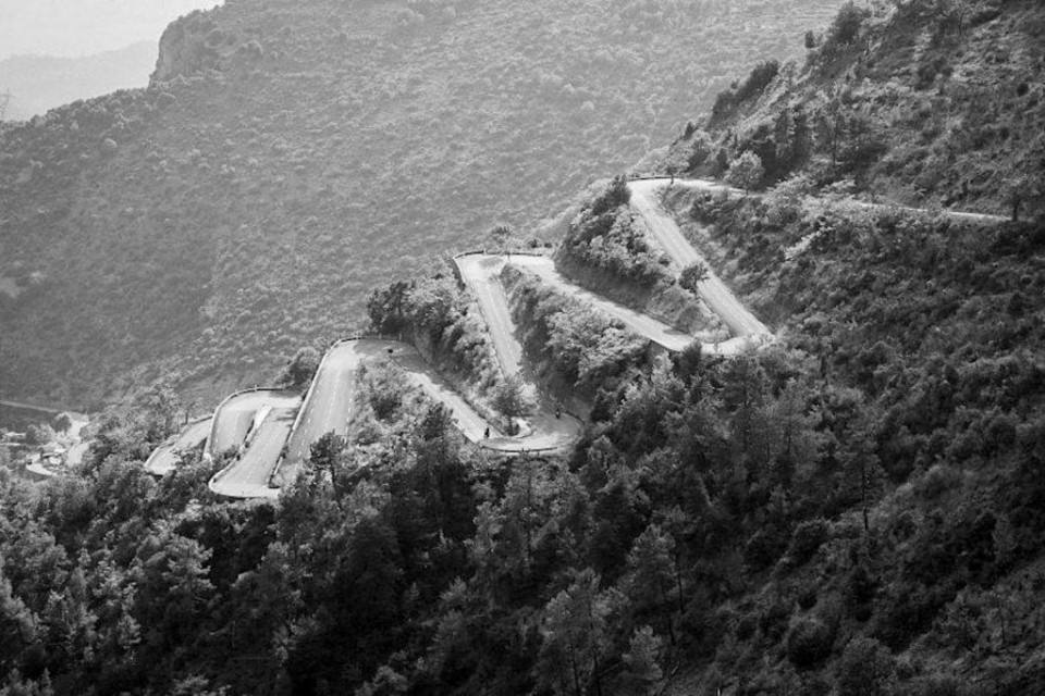 Black and white image of Col de Braus hairpins on Marmot Tours guided road cycling tour Southern Alps