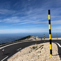 Cyclists rounding final hairpin of Mont Ventoux on Marmot Tours Ventoux Club des Cingles Challenge