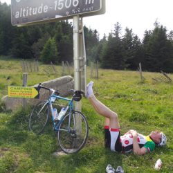 Tired cyclist on the Col de Jau on Marmot Tours Raid Pyrenean