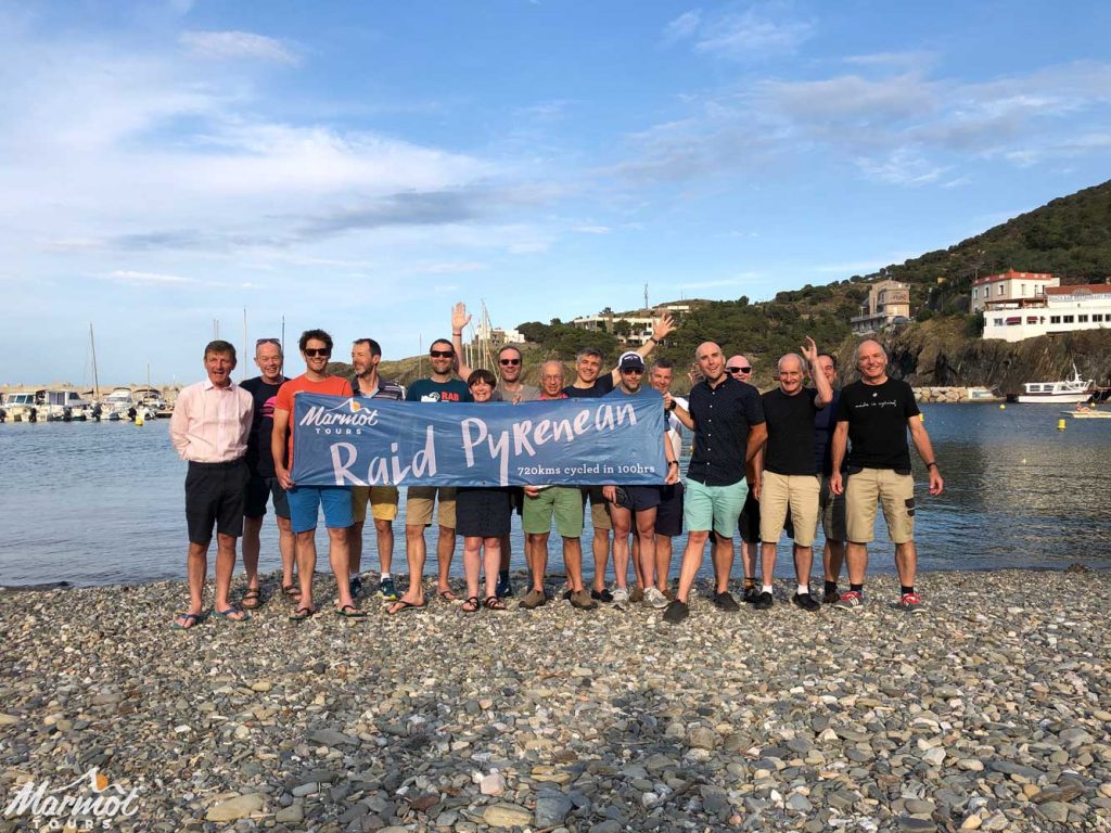 Celebrating completing Raid Pyrenean cycling challenge with Marmot Tours