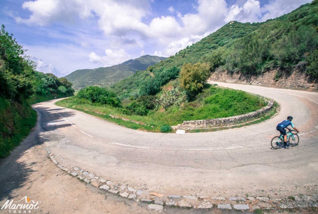 Cycling hairpin bend on guided road cycling holiday in Corsica with Marmot Tours