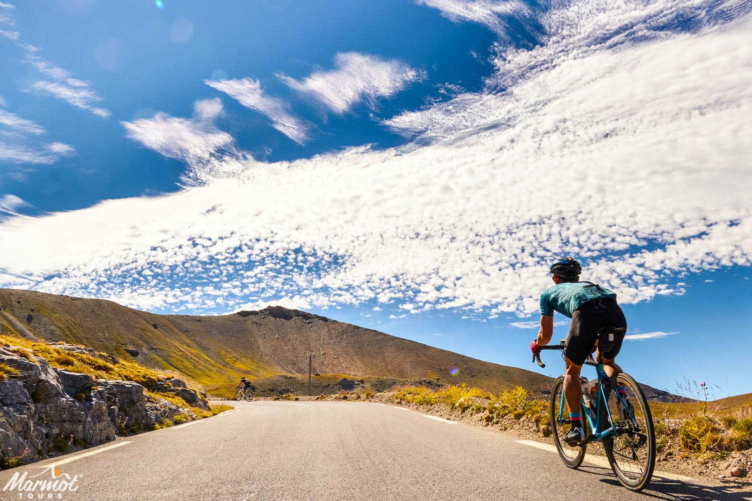 Cyclists on Raid Alpine road cycling challenge with Marmot Tours European road cycling holidays