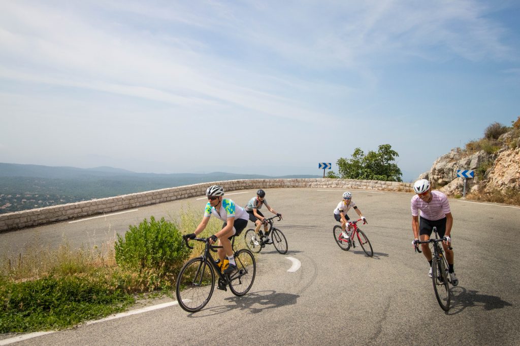 Group of cyclists on hairpin bend with Marmot Tours fully supported European road cycling holidays