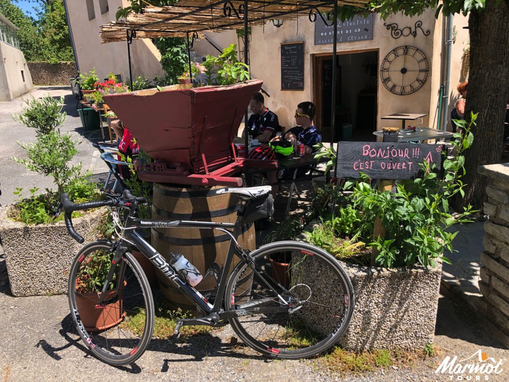 Bike outside café on French cycling holiday with Marmot Tours