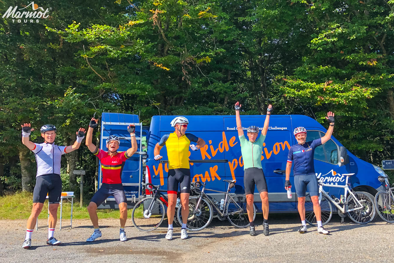 Cyclists jumping for joy on Marmot Tours cycling holidays in France