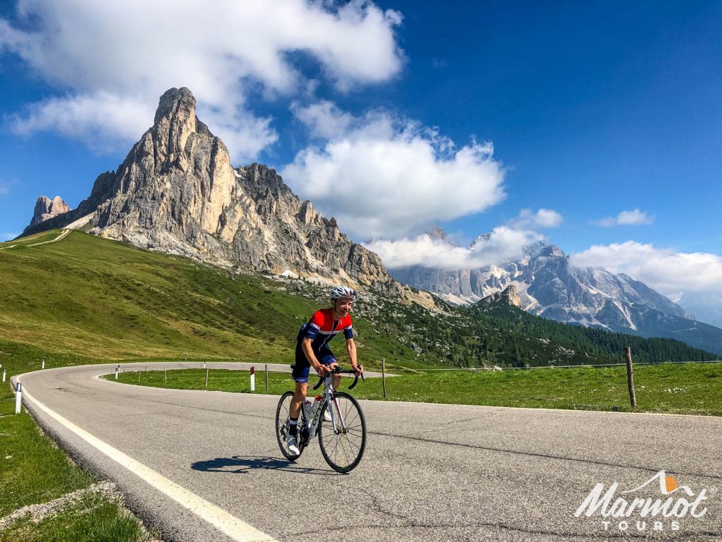 Cyclist climbing Passo di Giau on Marmot Tours road cycling holiday in Dolomites