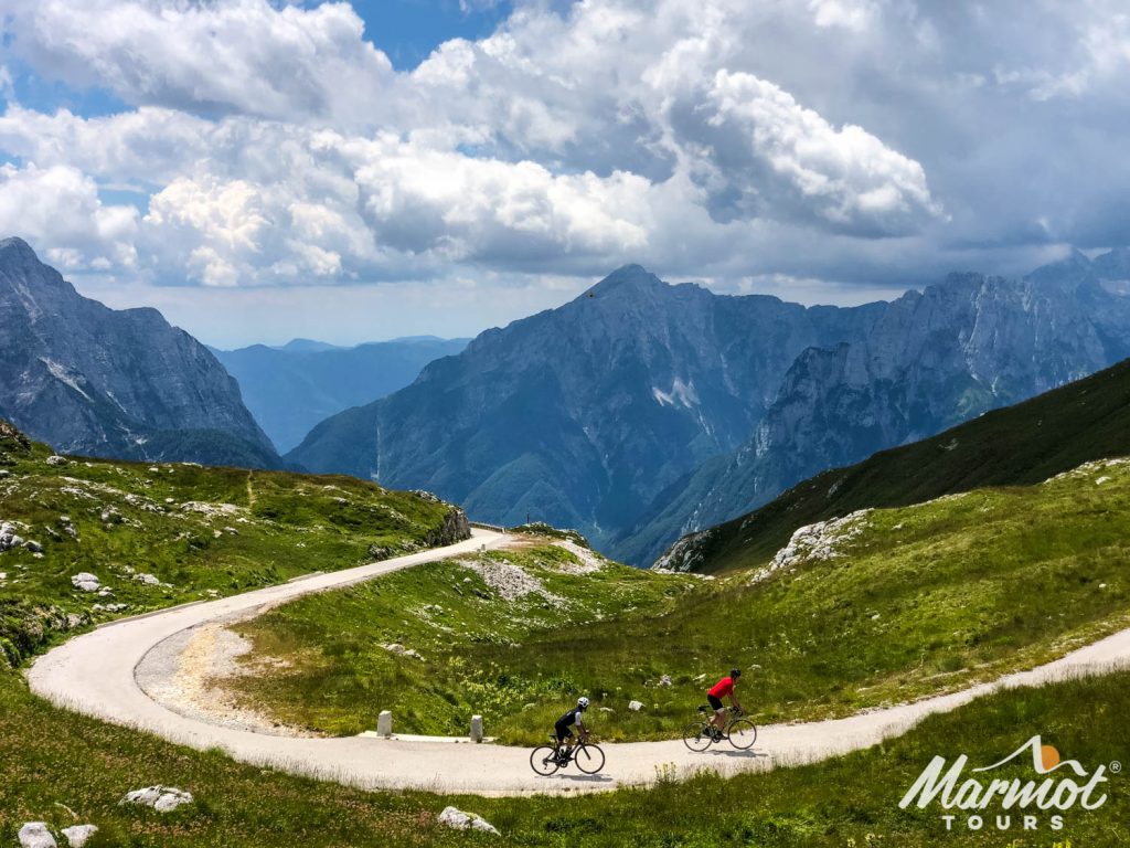 Two cyclists climbing in Slovenia mountains with Marmot Tours road cycling holidays