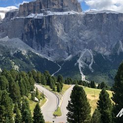 Cyclist climbing hairpin bend on Marmot Tours full support cycling tour of Dolomites Italy