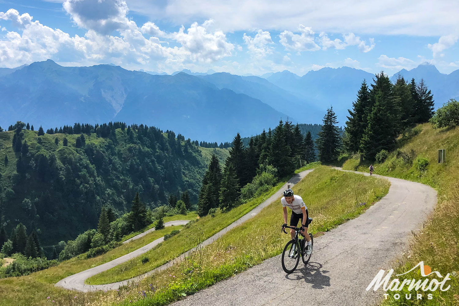 Cyclist near summit of Monte Zoncolan on marmot Tours road cycling holiday Slovenia