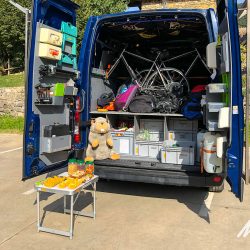 Marmot Tours fully stocked support vehicle with snacks water and bike parts on fully supported guided road cycling holiday Girona Catalonia Spain