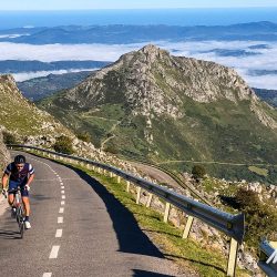 Cycling Alto de l'Angliru nearing summit in Picos de Europa Northern Spain guided road cycling tour with Marmot Tours