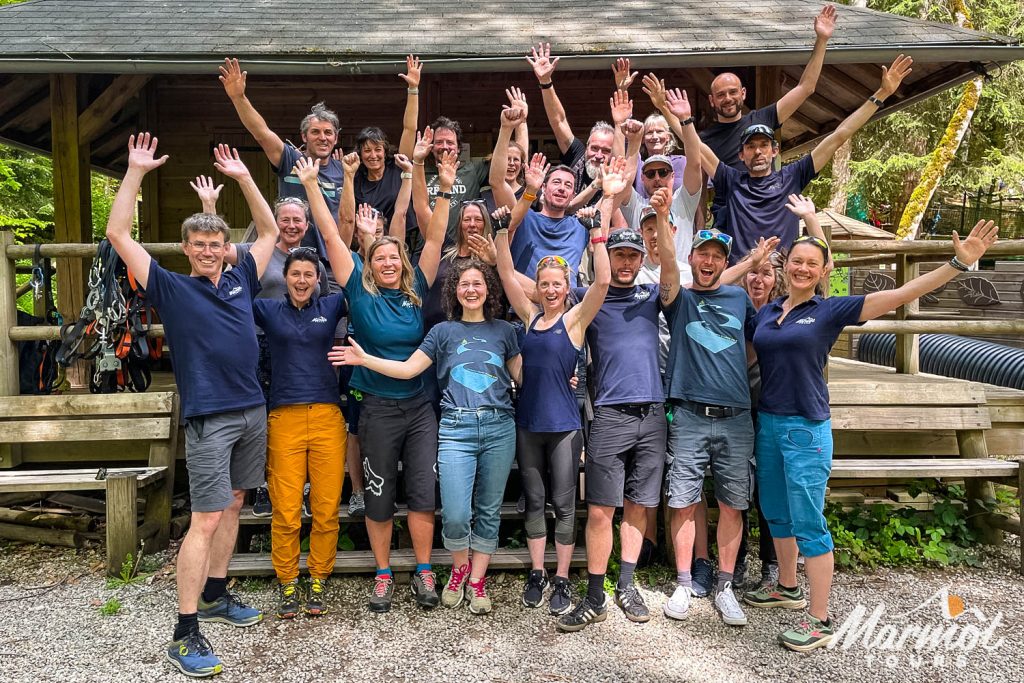 Marmot Tours guided road cycling holiday team with arms waving 2023