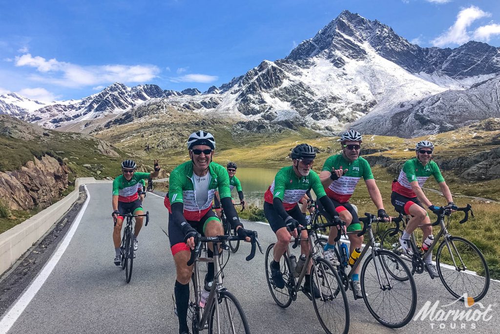 Group of cyclists enjoying Dolomites cycling climb with Marmot Tours