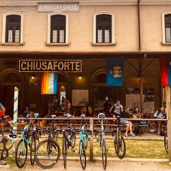 Group of cyclists gather at a café on Marmot Tours cycling holiday Slovenia