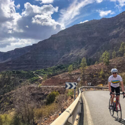 Cyclist enjoying a sunny climb on Marmot Tours road cycling tour of Gran Canaria