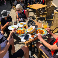 Cyclists enjoying lunch in local taverna on Gran Canaria full support road cycling tour with Marmot Tours