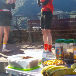 Cyclists enjoying fruit snacks and cake on full support road cycling tour Gran Canaria with Marmot Tours