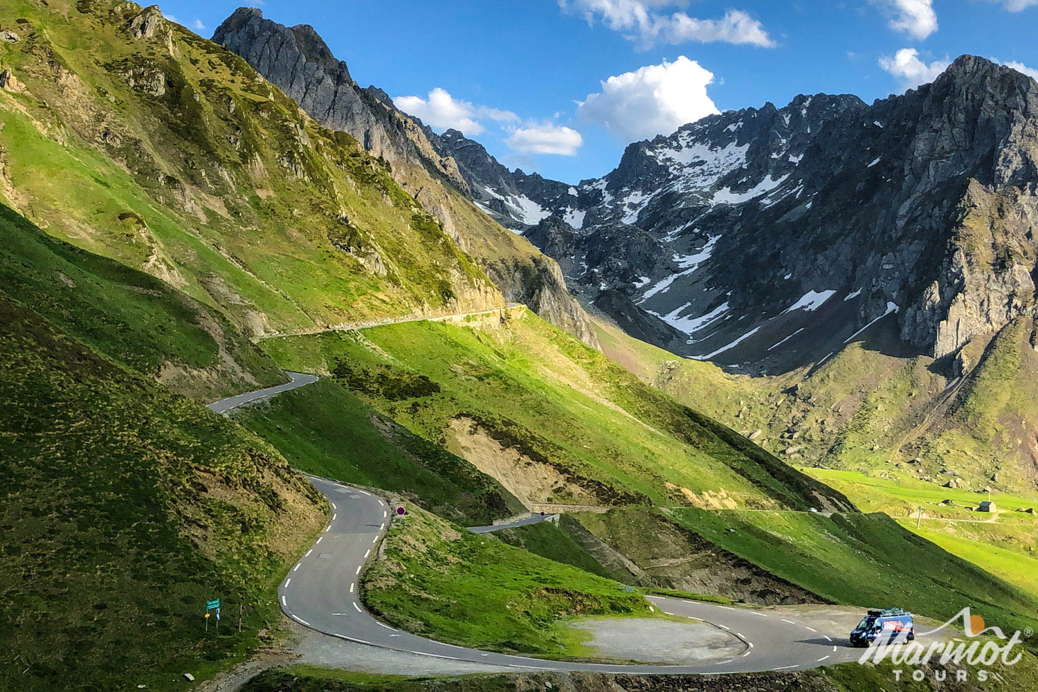 Marmot Tours support van parked at hairpin bend on Col du Tourmalet