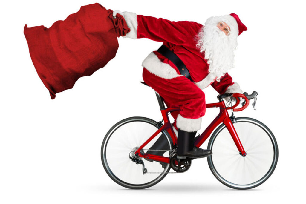 Santa riding bike with sack