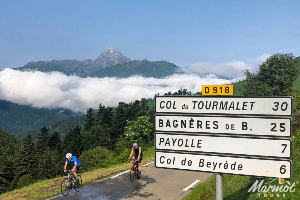 Pair of cyclists climbing Col d'Aspin on Raid Pyrenees with Marmot Tours