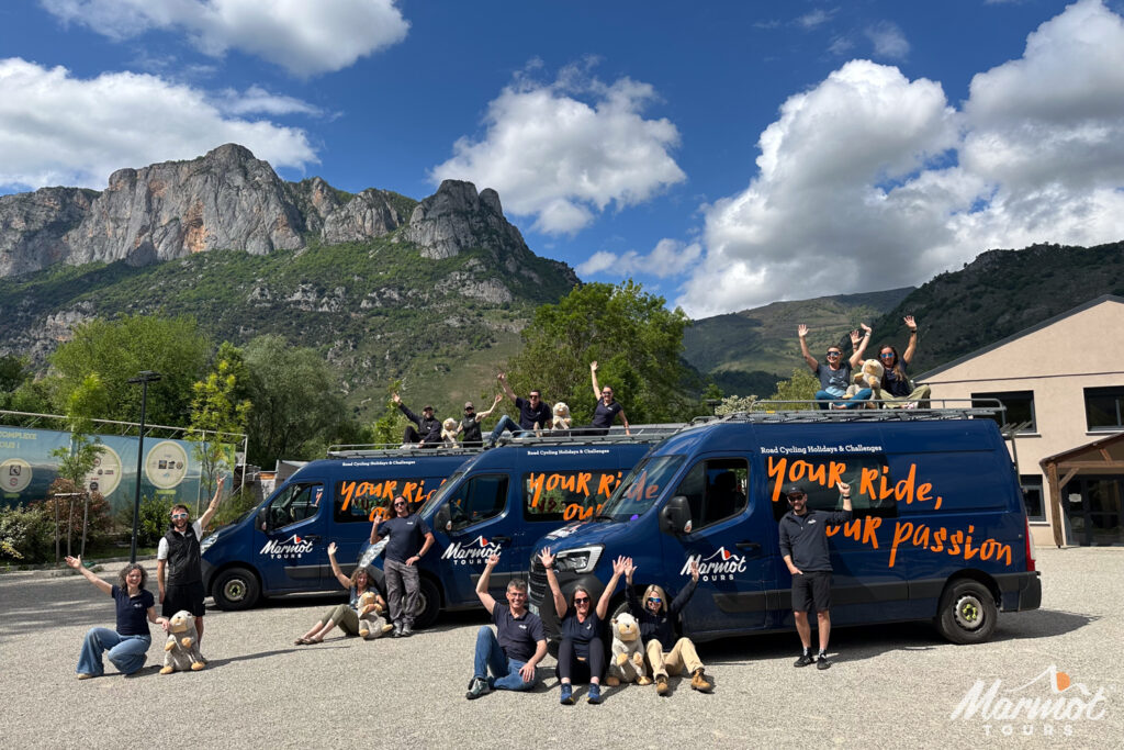 Some of the Marmot Tours guiding team for 2025 with 3 support vehicles